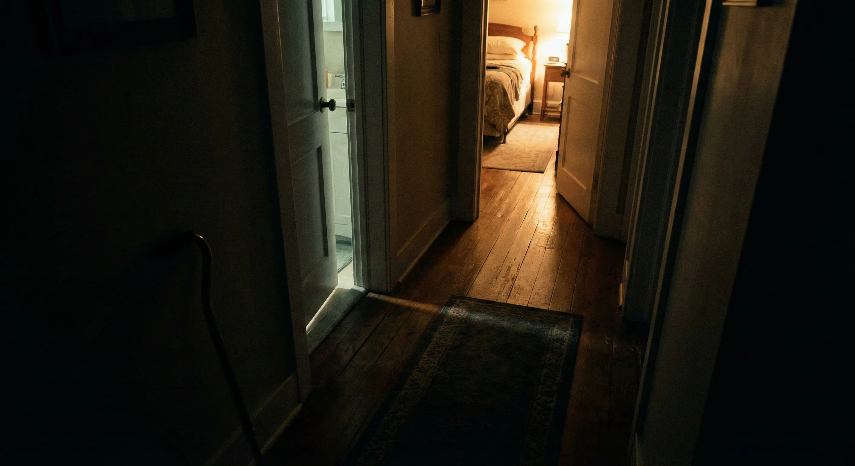 Dim hallway at night with poor visibility and trip hazards